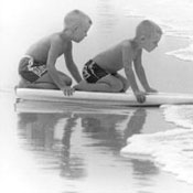 Two Little Boys on a Surf Board 
